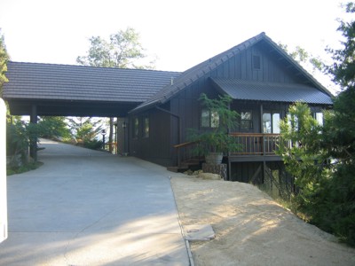 View of the house and carport from the garage
