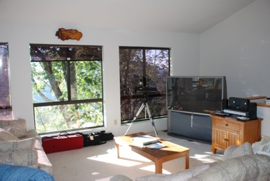 View of living room with TV and stereo