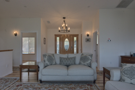 View of front door from living room