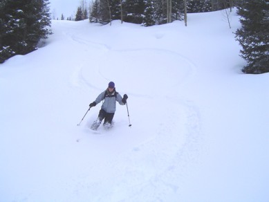 View of skier in deep snow